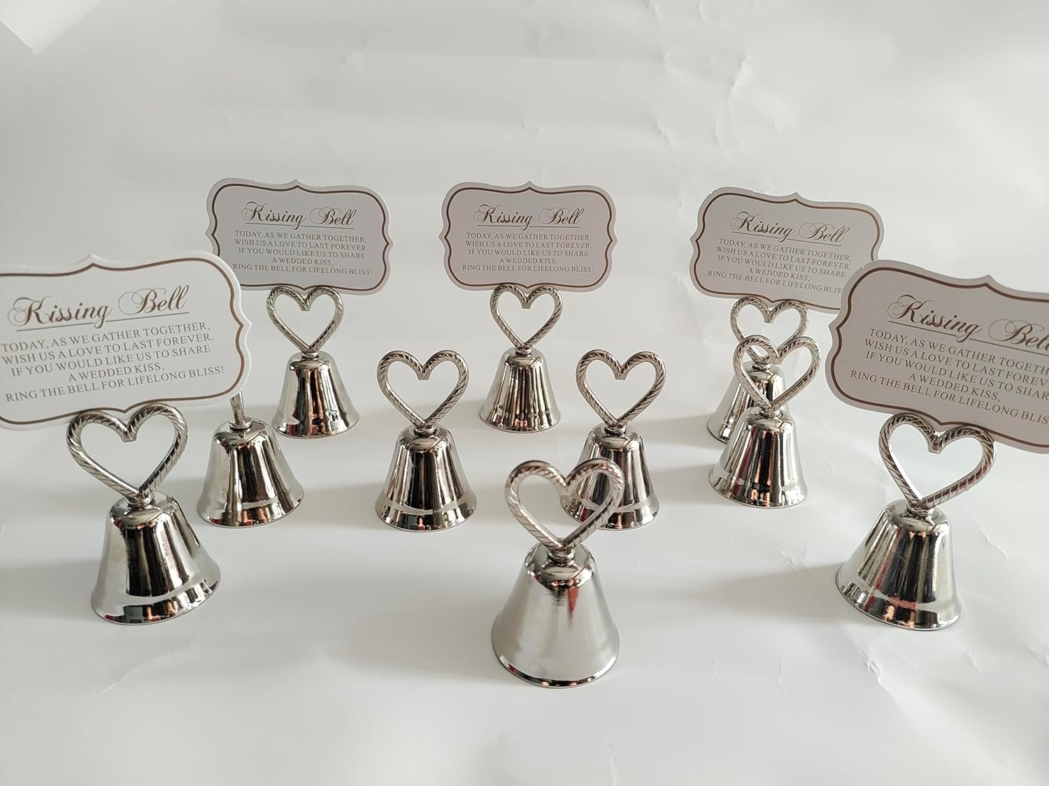 Wholesale 10Pcs Kissing Silver Bell Seat Table Card Place Number Photo Holders Party Favors Wedding Decorations Supplier