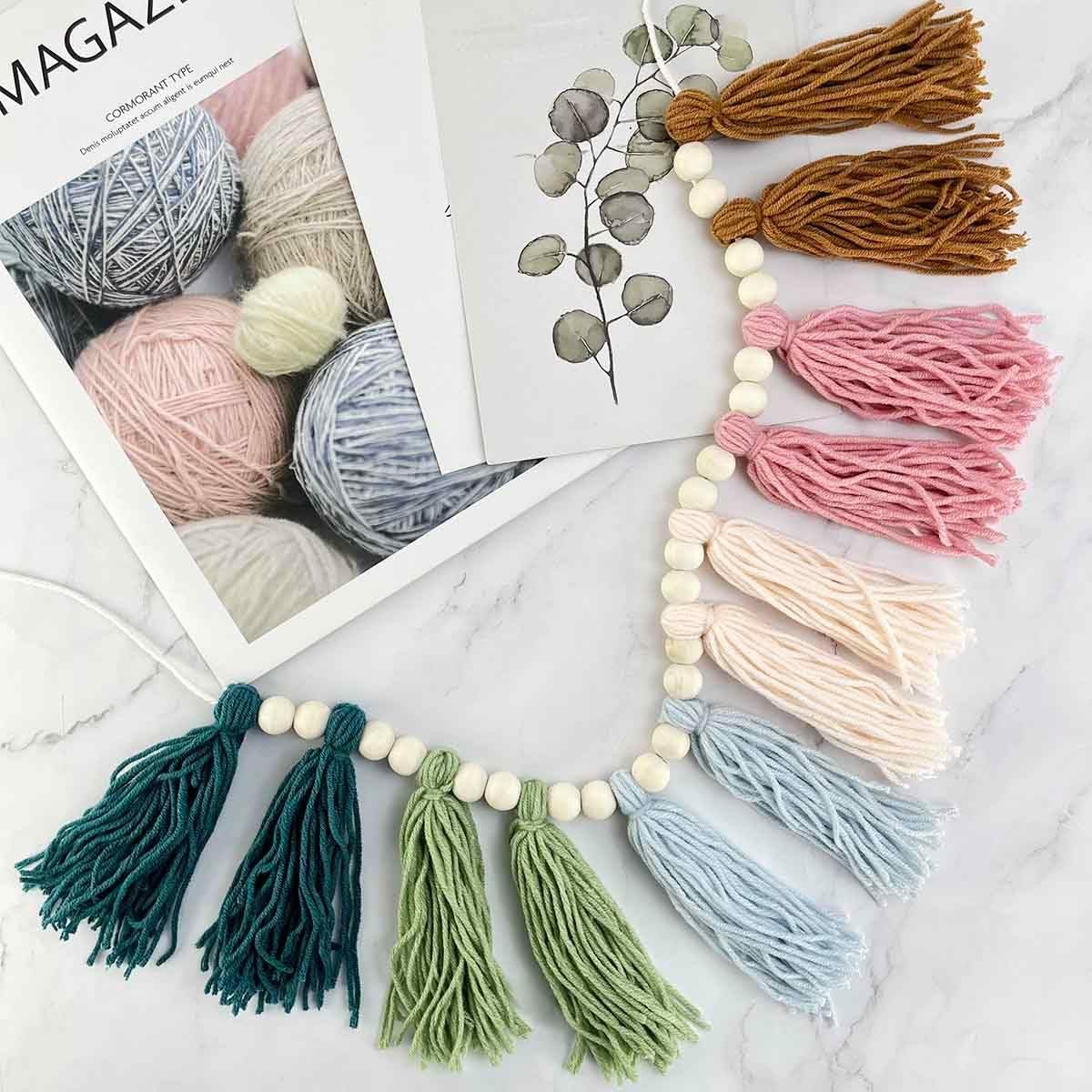 Wholesale Rainbow Boho Tassel Wall Hanging with Wood Beads Colorful Pastel Tassel Garland for Kids Room Classroom Bedroom Nursery Decoration Supplier Wholesale Rainbow Boho Tassel Wall Hanging with Wood Beads Colorful Pastel Tassel Garland for Kids Room Classroom Bedroom Nursery Decoration Supplier