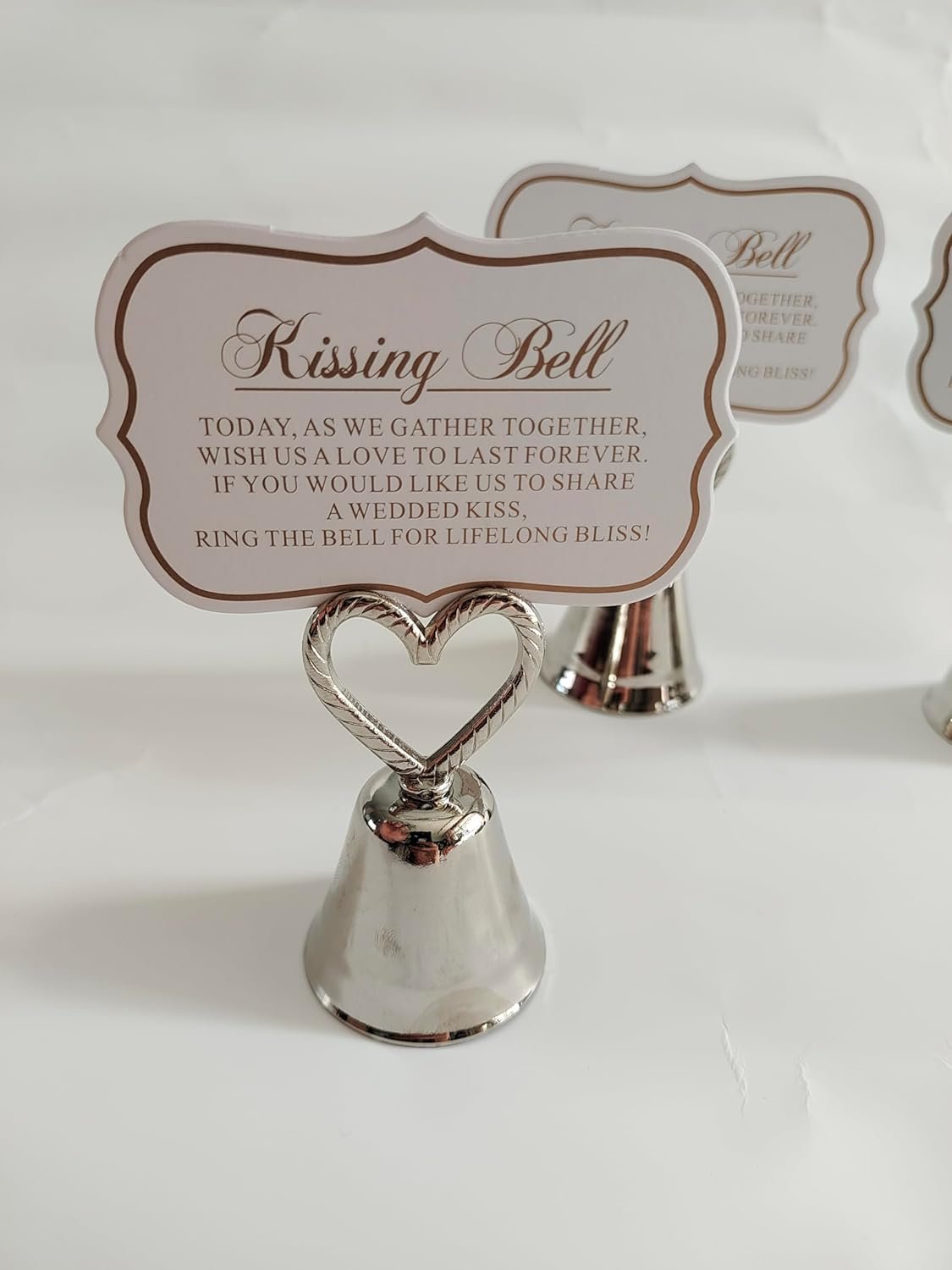 Wholesale 10Pcs Kissing Silver Bell Seat Table Card Place Number Photo Holders Party Favors Wedding Decorations Supplier